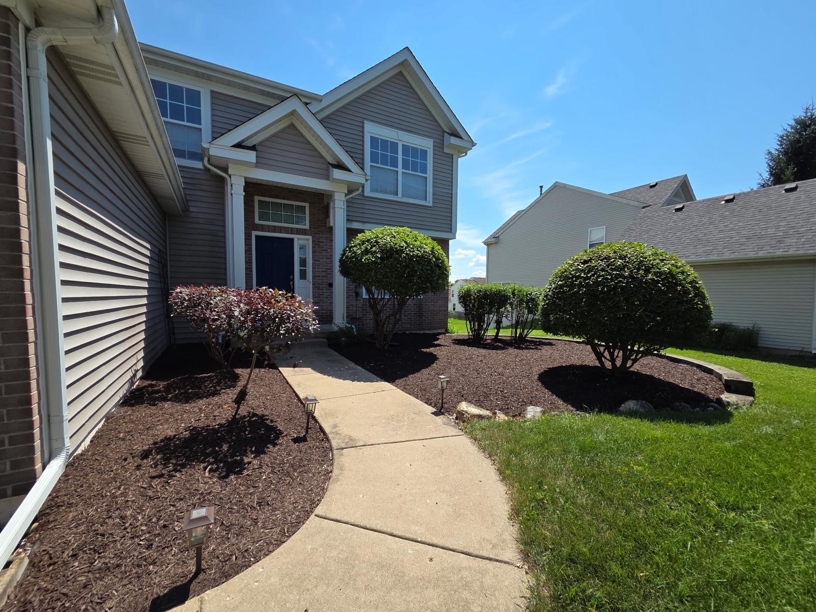 After landscaping - front entry